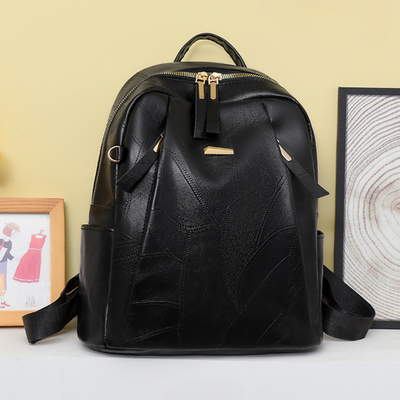 LEA™ | Lederrucksack mit Blattstruktur