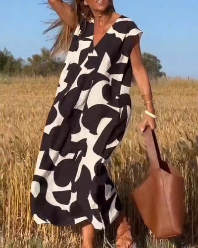 ELENA KLEID MIT PRINTMUSTER UND V-AUSSCHNITT