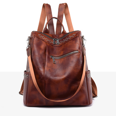 LEONIE™ | VERWANDELBARER LEDERRUCKSACK MIT NIETEN