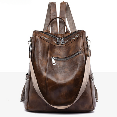 LEONIE™ | VERWANDELBARER LEDERRUCKSACK MIT NIETEN