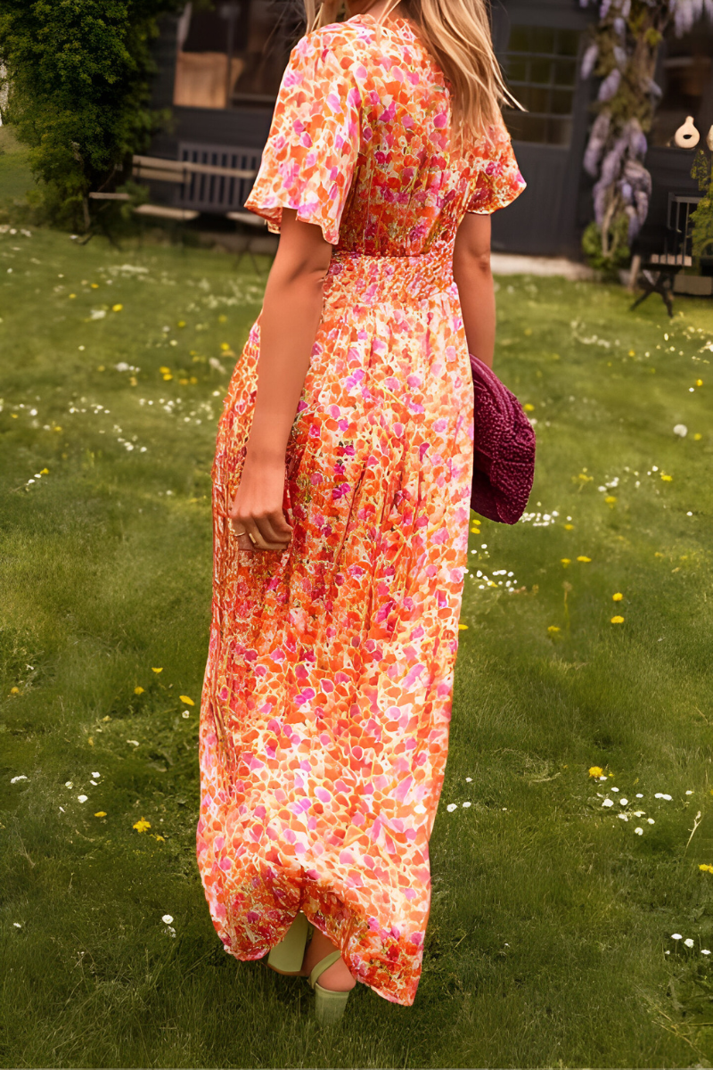 Elegantes Blumen-Maxikleid – Luftig, Farbig & Figurschmeichelnd