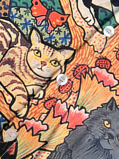 Noemia | verspieltes und buntes top mit katze und schmetterling