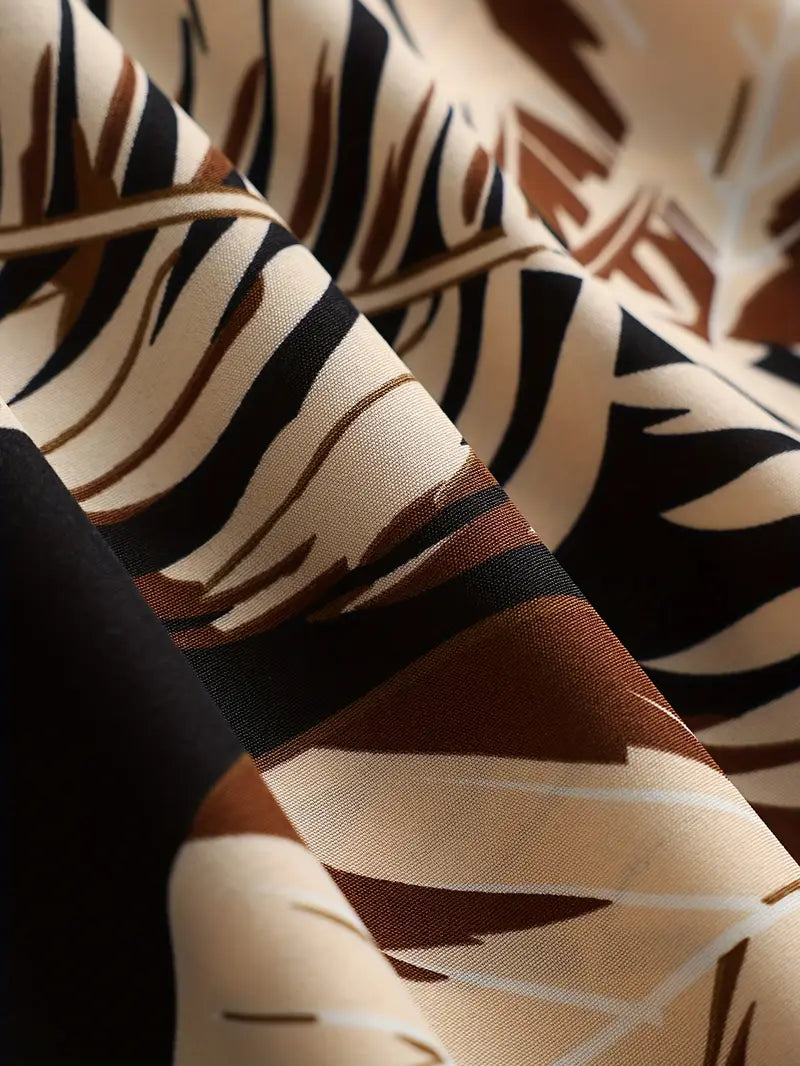 Kamala – A-Linien-Kleid mit Spaghettiträgern und tropischem Print