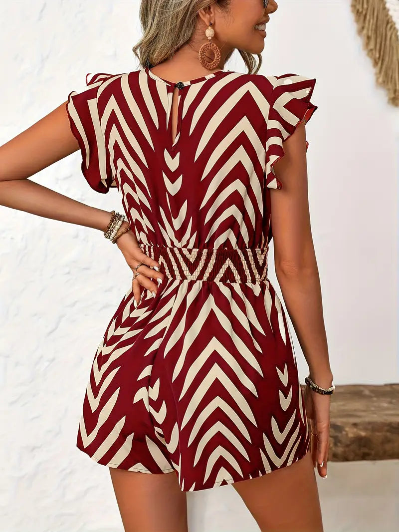 Alona – Schicker Strampler mit Chevron-Muster und Flügelärmeln
