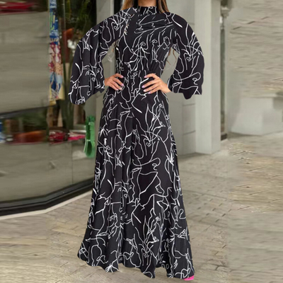 Celia – Eleganter Jumpsuit mit abstraktem Muster und langen Ärmeln