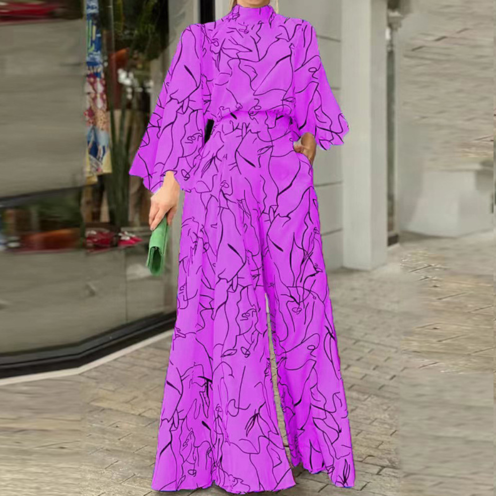 Celia – Eleganter Jumpsuit mit abstraktem Muster und langen Ärmeln