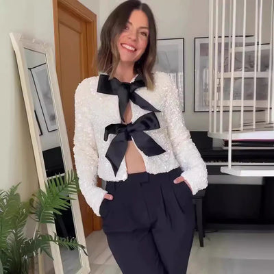 SHIMMERING SHORT JACKET MIT SCHLEIFE