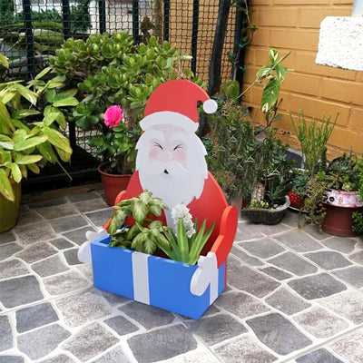 Blumentopf im Weihnachtsmann-Design