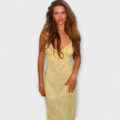 Maxikleid mit geheimnisvollem Blumenmuster und tiefem Ausschnitt