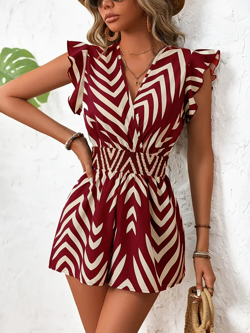 Alona – Schicker Strampler mit Chevron-Muster und Flügelärmeln