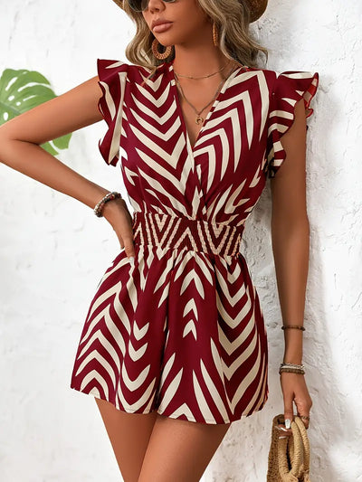 Alona – Schicker Strampler mit Chevron-Muster und Flügelärmeln