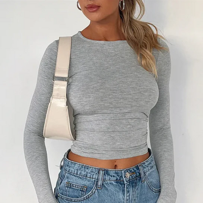 Rhianna -  Elegant geschnittene Bluse mit Rundhalsausschnitt und langen Ärmeln